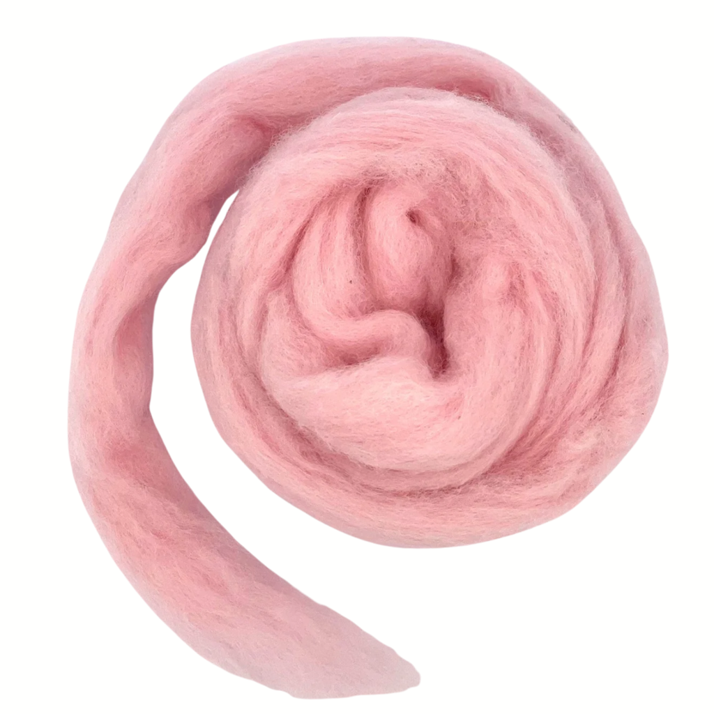 Pink wool roving on a white background