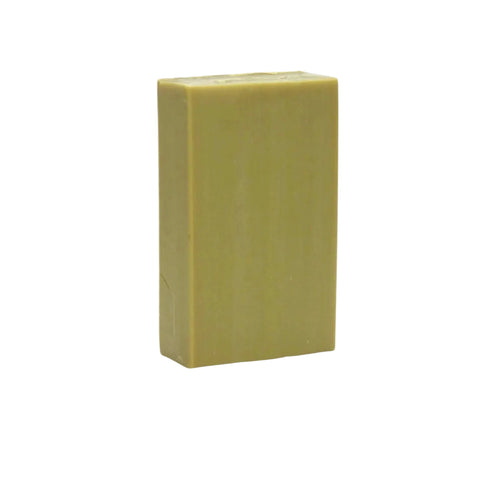 Green rectangular soap bar on a white marble background
